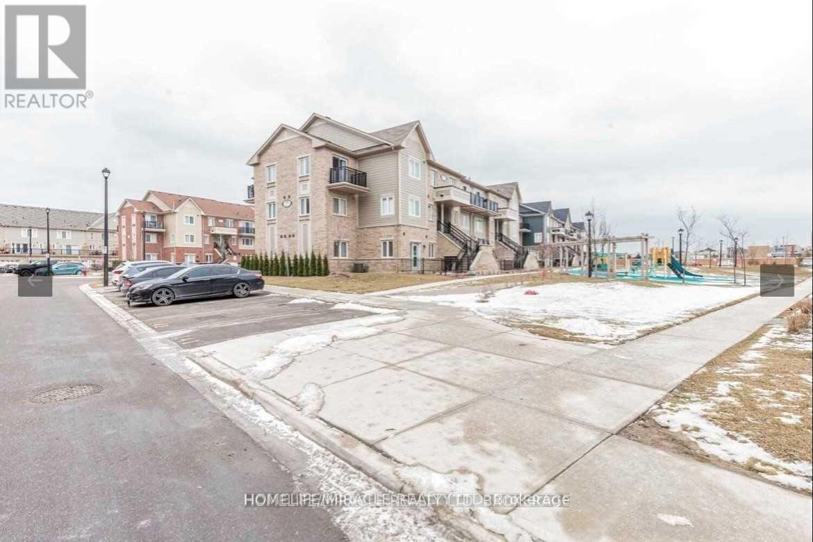 309 - 250 Sunny Meadow Boulevard, Brampton, Ontario L6R 3Y6 - Photo 3 - W12599632