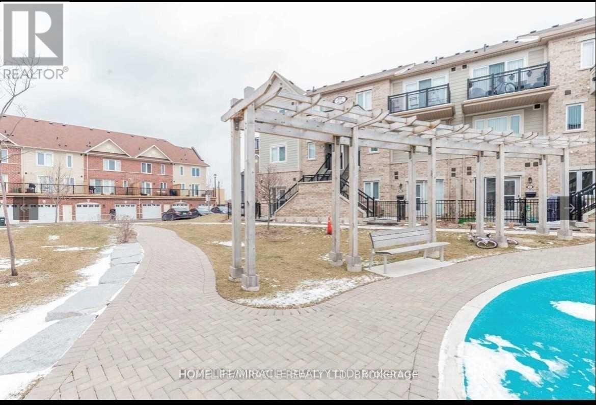 309 - 250 Sunny Meadow Boulevard, Brampton, Ontario L6R 3Y6 - Photo 7 - W12599632
