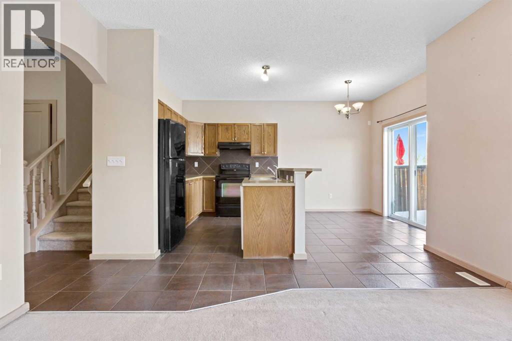 1083 Prairie Springs Hill Sw, Airdrie, Alberta  T4B 0E7 - Photo 5 - A2272902