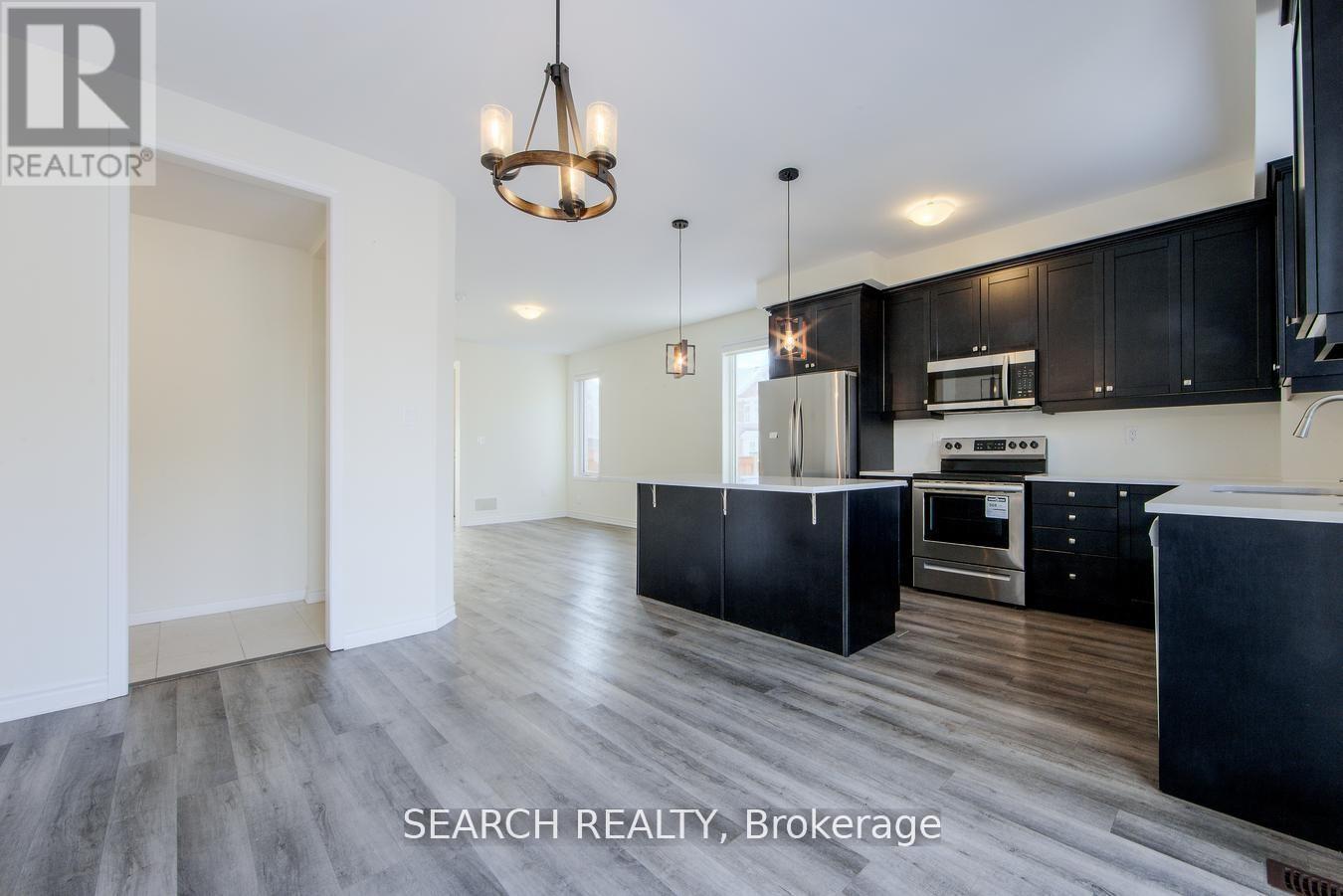 988 Cherry Court, Milton, Ontario  L9E 1P8 - Photo 5 - W12599936