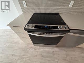 313 - 720 Whitlock Avenue, Milton, Ontario  L9E 2B5 - Photo 8 - W12600554