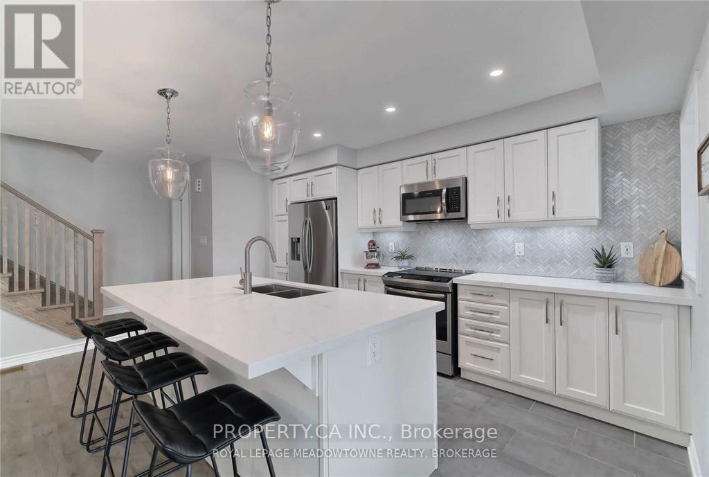 1244 Rose Way N, Milton, Ontario L9E 1L9 - Photo 9 - W12594326