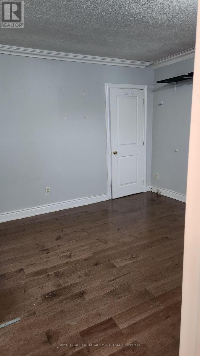 Upper Unit - 1017 Weston Road, Toronto, Ontario M6N 3R9 - Photo 6 - W12565612