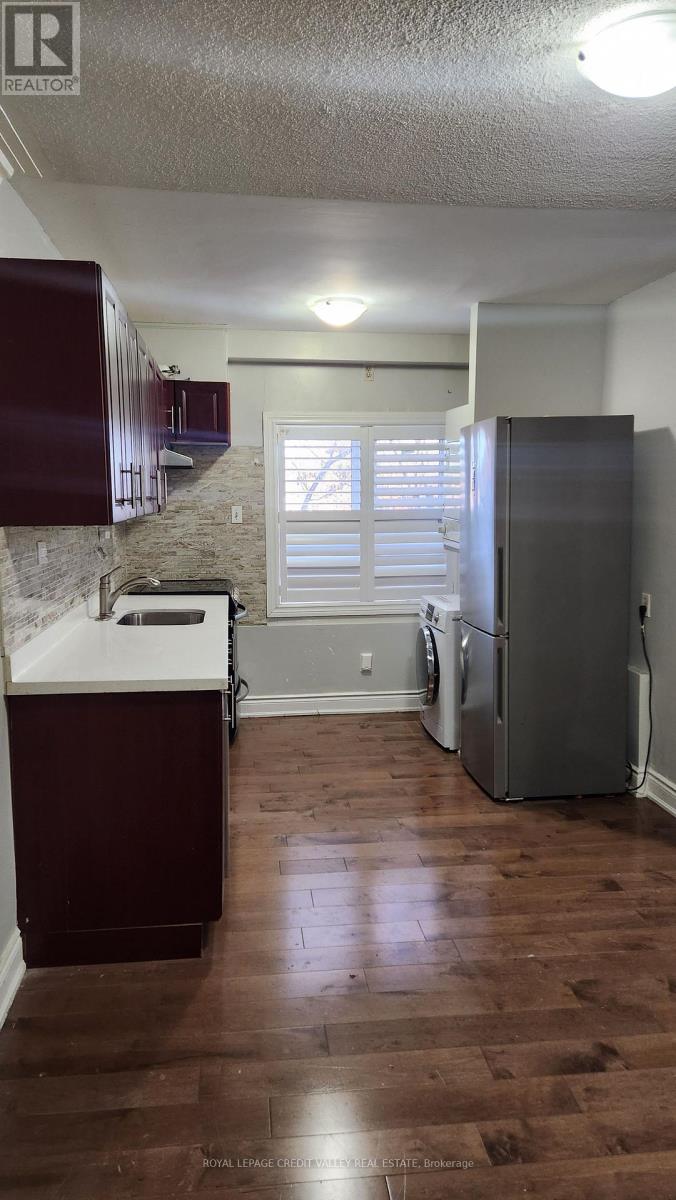 Upper Unit - 1017 Weston Road, Toronto, Ontario M6N 3R9 - Photo 13 - W12565612