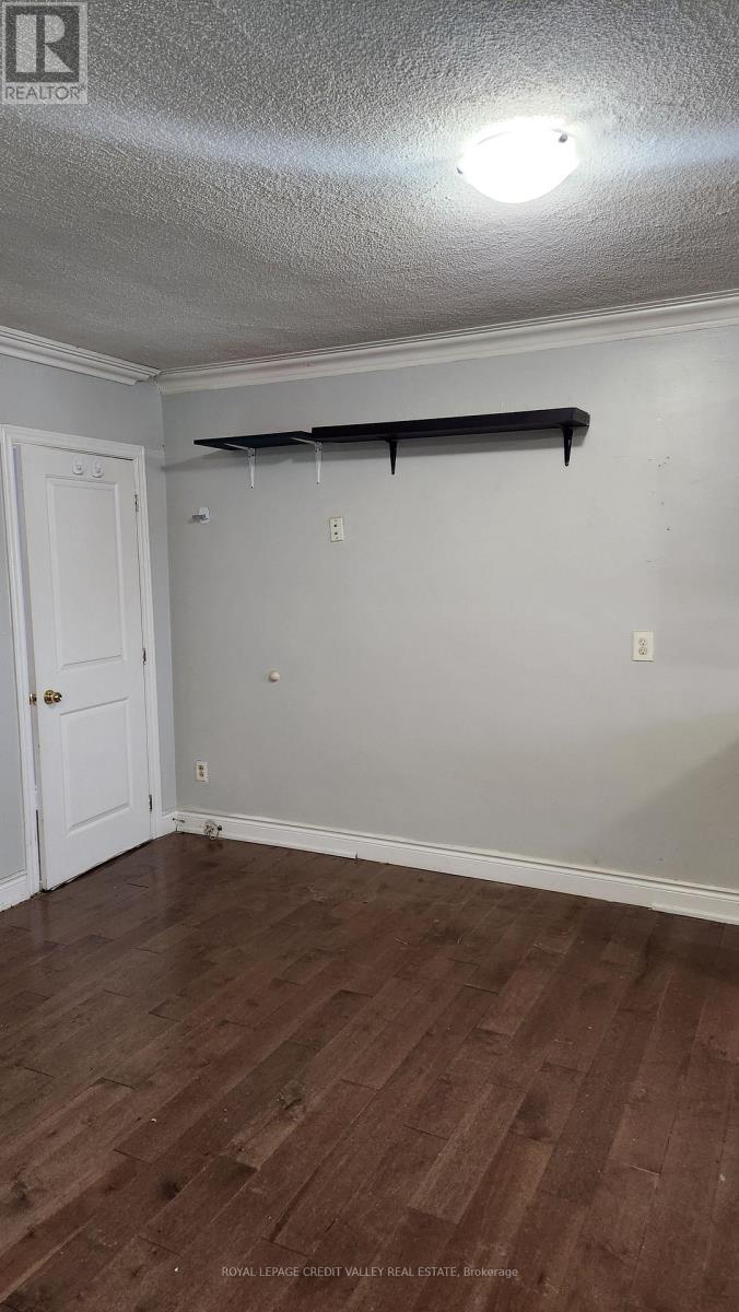 Upper Unit - 1017 Weston Road, Toronto, Ontario M6N 3R9 - Photo 7 - W12565612