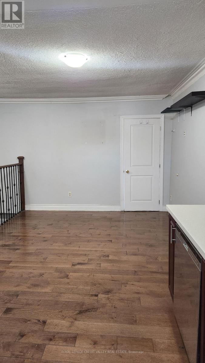 Upper Unit - 1017 Weston Road, Toronto, Ontario M6N 3R9 - Photo 12 - W12565612