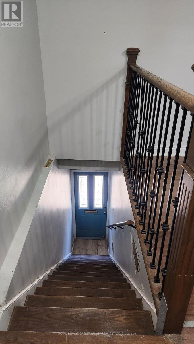 Upper Unit - 1017 Weston Road, Toronto, Ontario M6N 3R9 - Photo 3 - W12565612