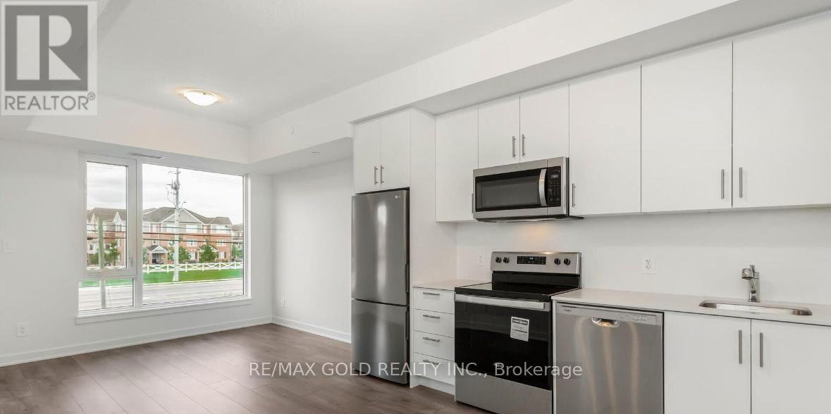 211 - 1440 Clarriage Court, Milton, Ontario  L9E 1B3 - Photo 4 - W12601444