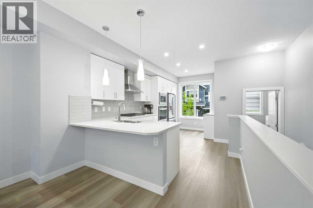 908 Sage Hill Grove Nw, Calgary, Alberta  T3R 2A2 - Photo 4 - A2269001