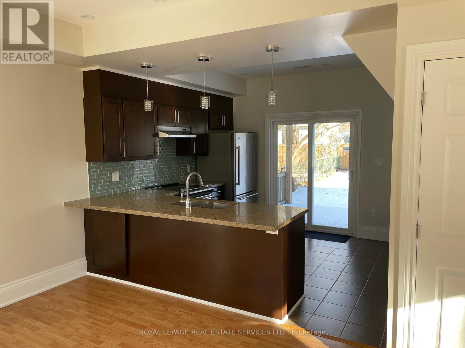 11 Uno Drive, Toronto, Ontario  M8Z 3N7 - Photo 8 - W12602060