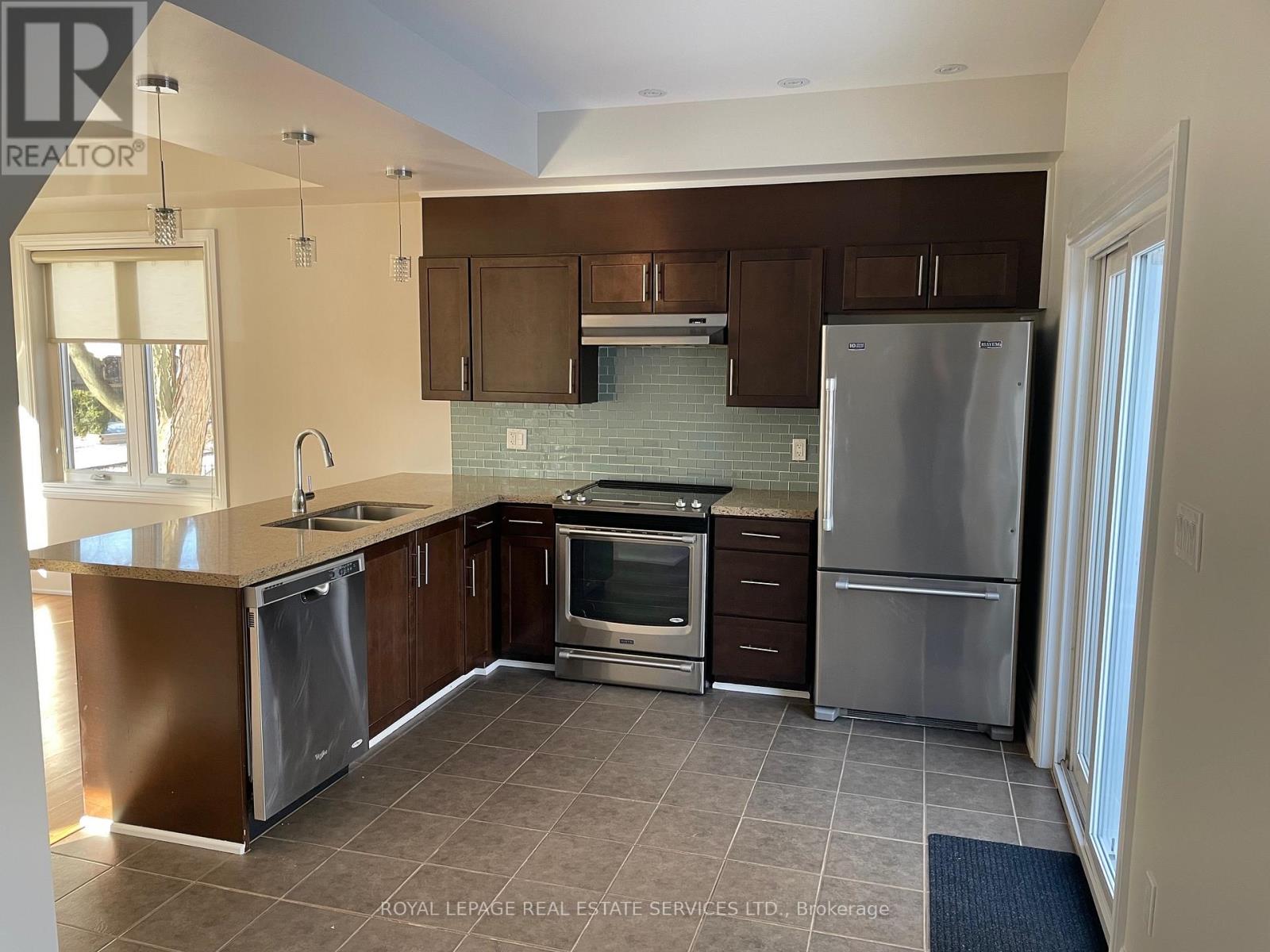 11 Uno Drive, Toronto, Ontario  M8Z 3N7 - Photo 9 - W12602060