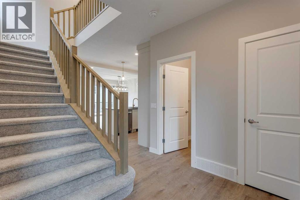 1478 Bayview Point Sw, Airdrie, Alberta  T4B 3N8 - Photo 6 - A2272597