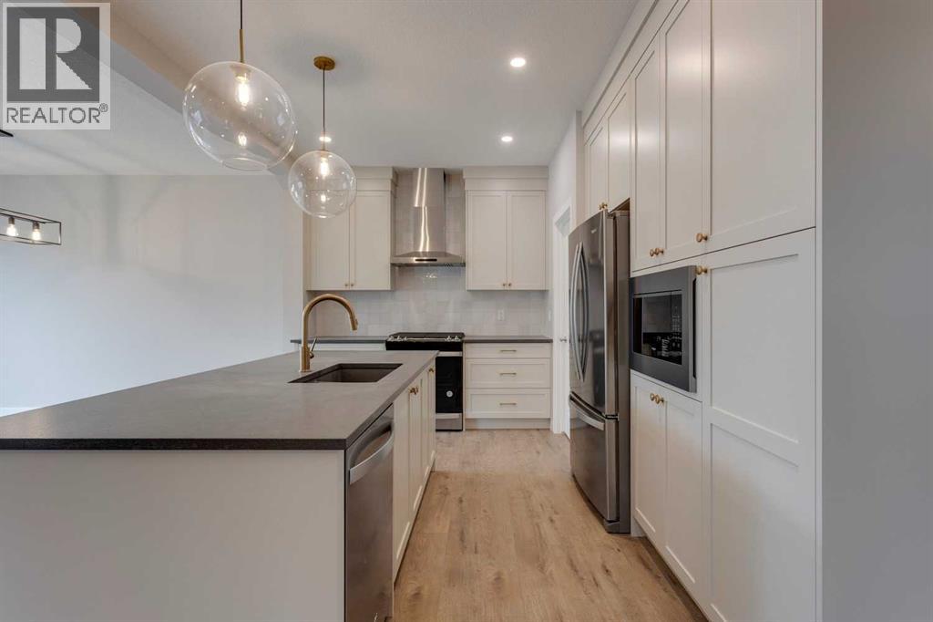 1478 Bayview Point Sw, Airdrie, Alberta  T4B 3N8 - Photo 9 - A2272597