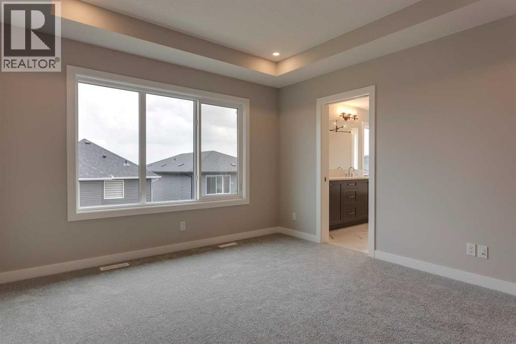 1478 Bayview Point Sw, Airdrie, Alberta  T4B 3N8 - Photo 21 - A2272597