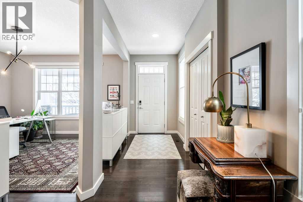 78 Ypres Green Sw, Calgary, Alberta  T2T 6M1 - Photo 4 - A2272935