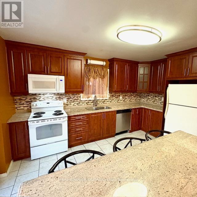 63 Acadian Heights, Brampton, Ontario  L6Y 4H3 - Photo 6 - W12602330