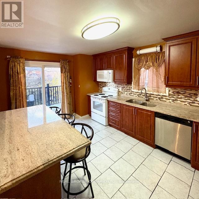 63 Acadian Heights, Brampton, Ontario  L6Y 4H3 - Photo 7 - W12602330