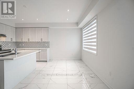 Upper - 37 Hashmi Place, Brampton, Ontario  L6Y 6K1 - Photo 8 - W12602436