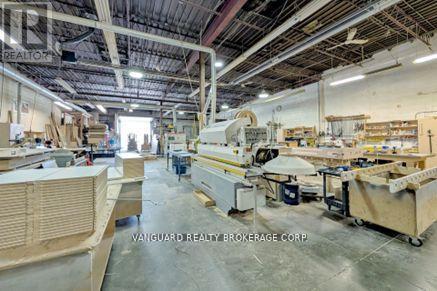 557 Fenmar Drive, Toronto, Ontario  M9L 2R6 - Photo 3 - W12602674