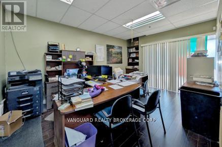 557 Fenmar Drive, Toronto, Ontario  M9L 2R6 - Photo 6 - W12602674