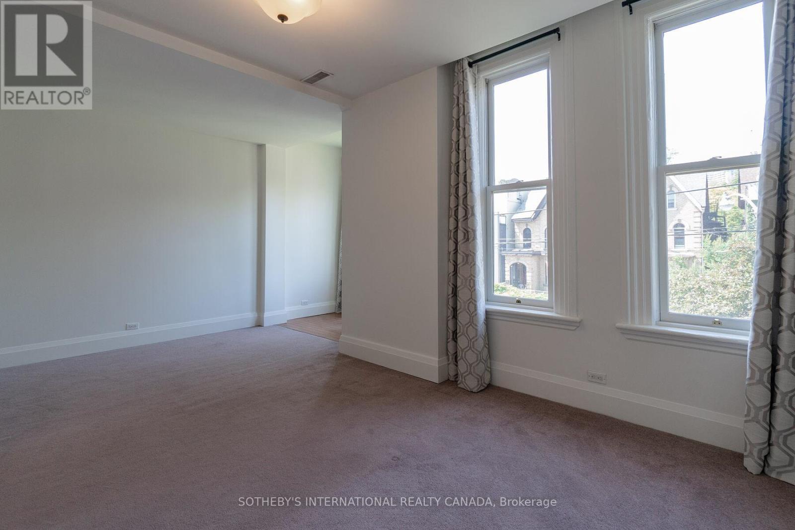Unit 2 - 215 Carlton Street, Toronto, Ontario  M5A 2K9 - Photo 13 - C12601044