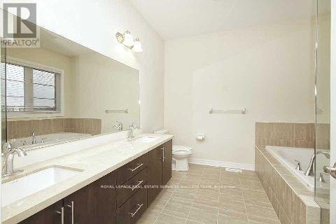81 Kaitting Trail, Oakville, Ontario  L6M 0T6 - Photo 7 - W12603312