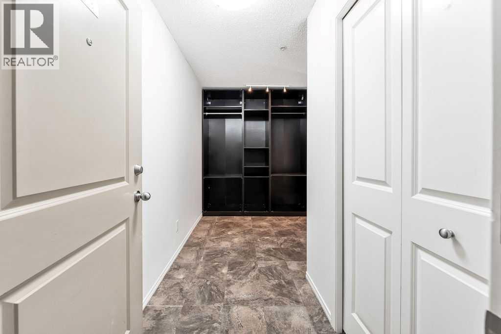 9113, 403 Mackenzie Way Sw, Airdrie, Alberta  T4B 3V7 - Photo 7 - A2273359