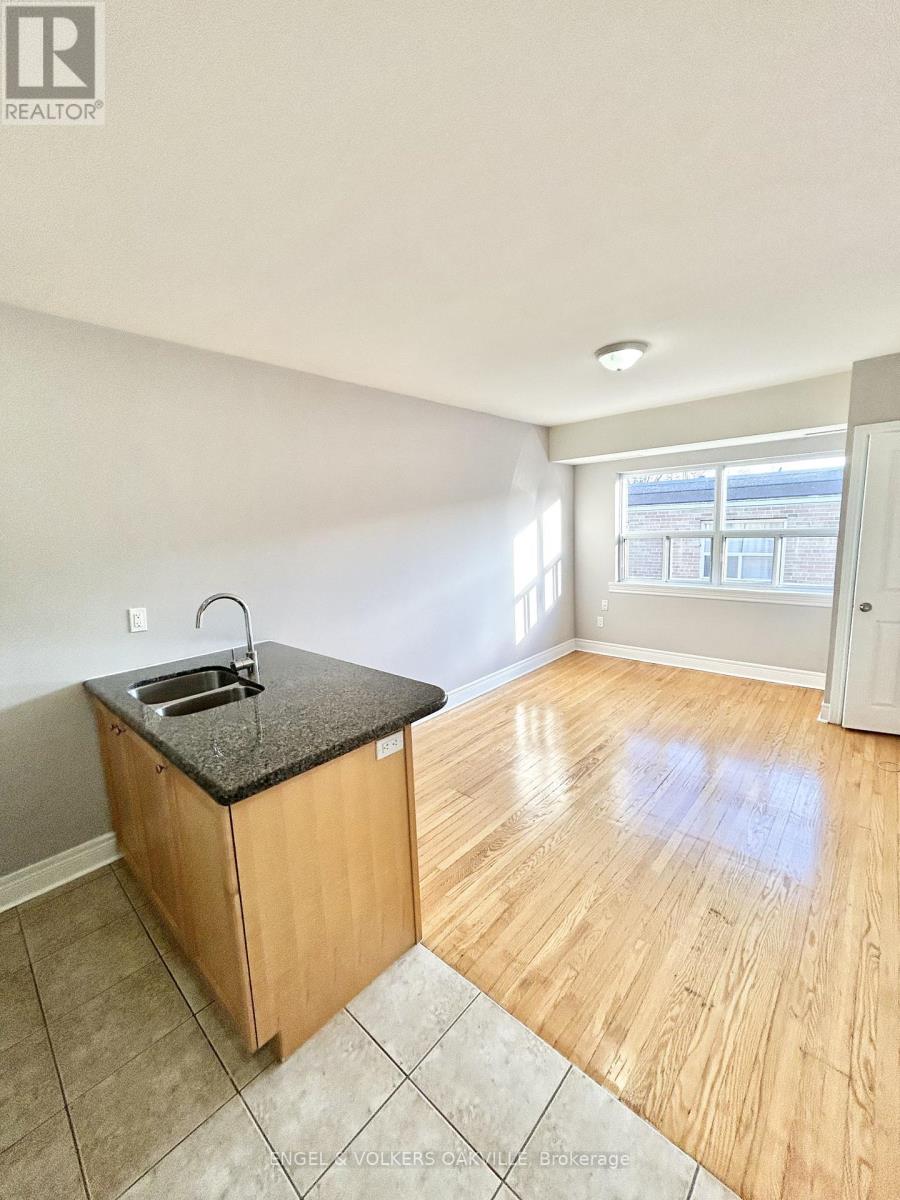 303 - 11 Thirty Third Street, Toronto, Ontario  M8W 3G7 - Photo 3 - W12604024