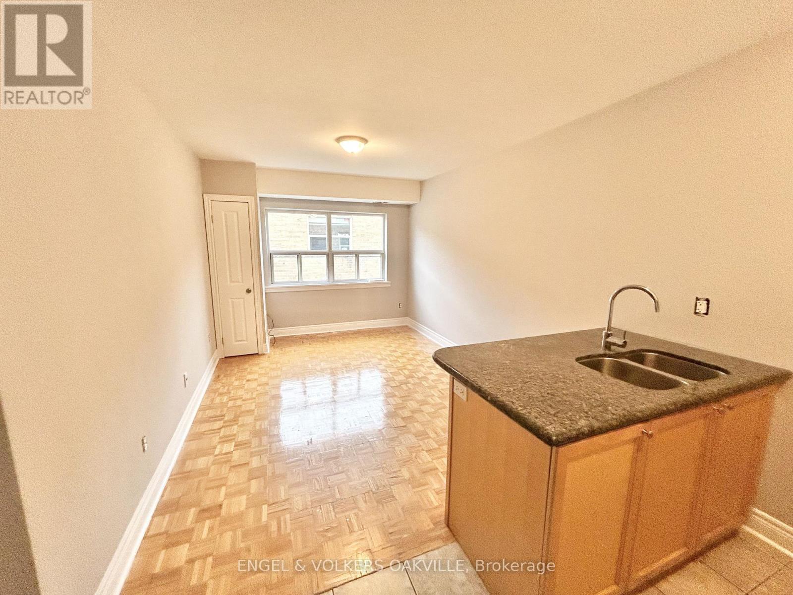 304 - 11 Thirty Third Street, Toronto, Ontario  M8W 3G7 - Photo 2 - W12604028
