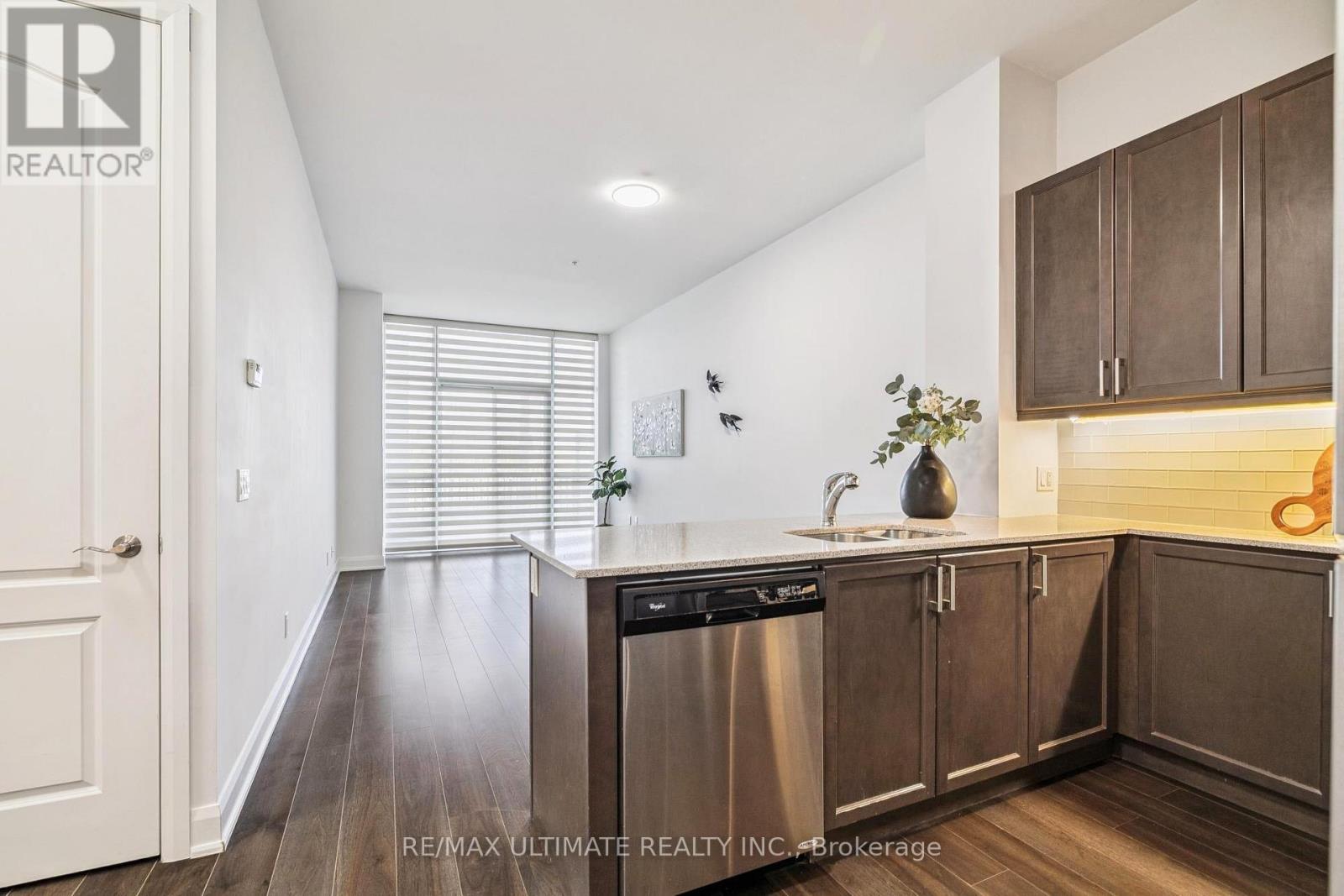 110 - 2480 Prince Michael Drive, Oakville, Ontario L6H 0H1 - Photo 2 - W12578526