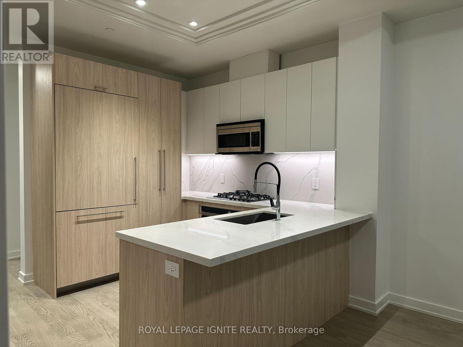 207 - 123 Maurice Drive, Oakville, Ontario  L6K 2W6 - Photo 5 - W12604498