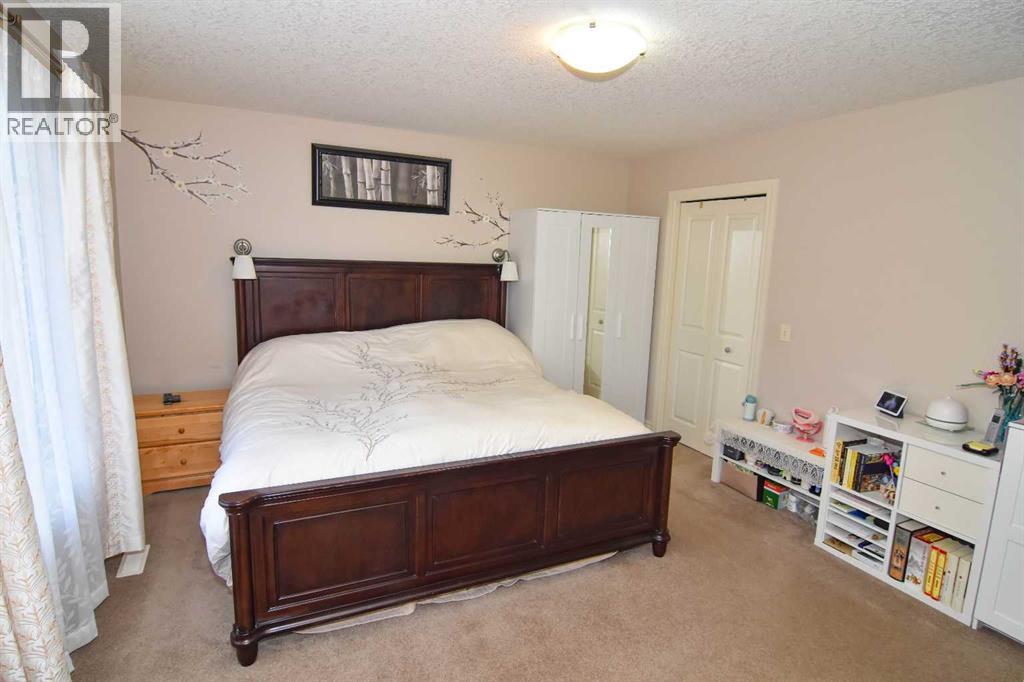 107 Panatella Close Nw, Calgary, Alberta  T3K 0N2 - Photo 30 - A2265413