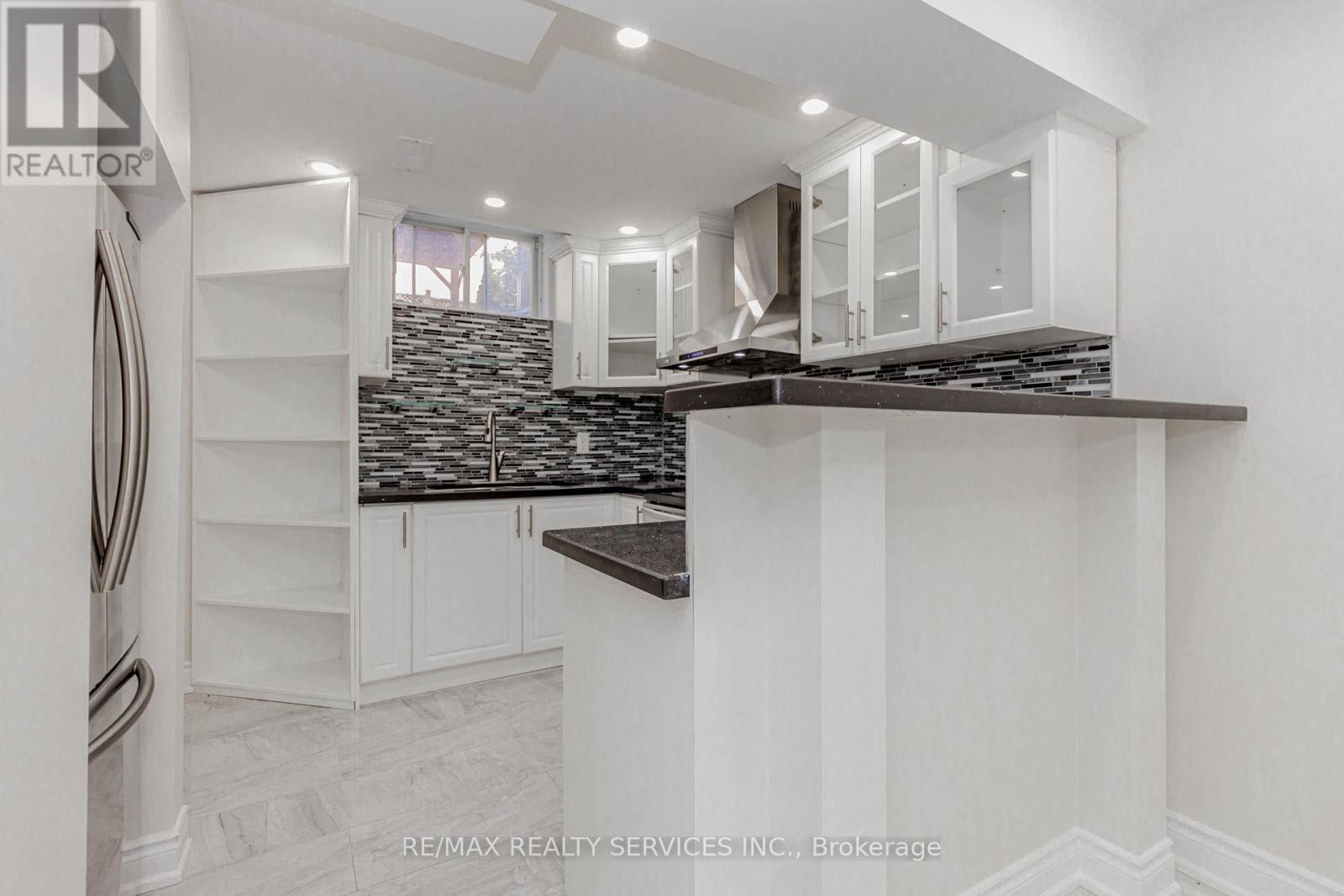 Basement - 50 Amboise Crescent, Brampton, Ontario L7A 3H2 - Photo 9 - W12604874