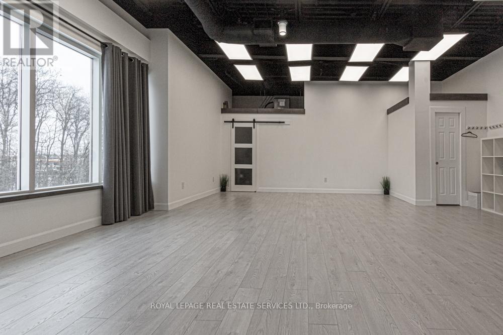 207 - 3475 Rebecca Street, Oakville, Ontario  L6L 6X9 - Photo 2 - W12605020