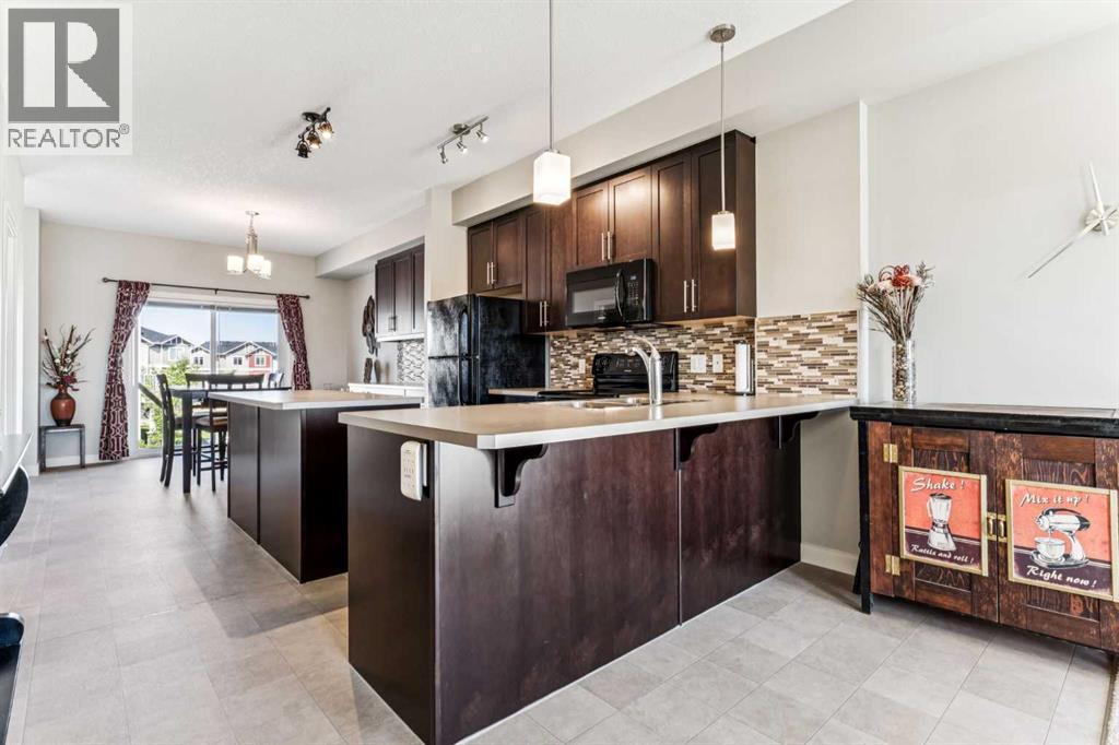 79 Redstone Circle Ne, Calgary, Alberta  T3N 0M8 - Photo 5 - A2253080