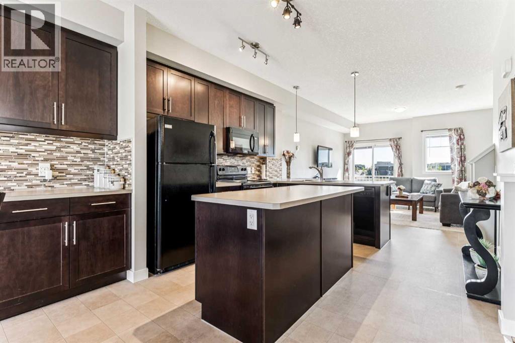 79 Redstone Circle Ne, Calgary, Alberta  T3N 0M8 - Photo 3 - A2253080