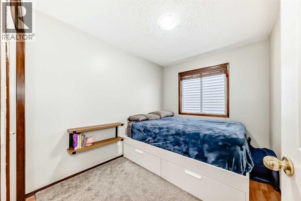 219 Sandstone Drive Nw, Calgary, Alberta  t3k 3b9 - Photo 16 - A2272588