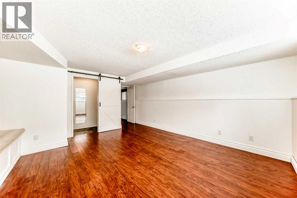 219 Sandstone Drive Nw, Calgary, Alberta  t3k 3b9 - Photo 22 - A2272588