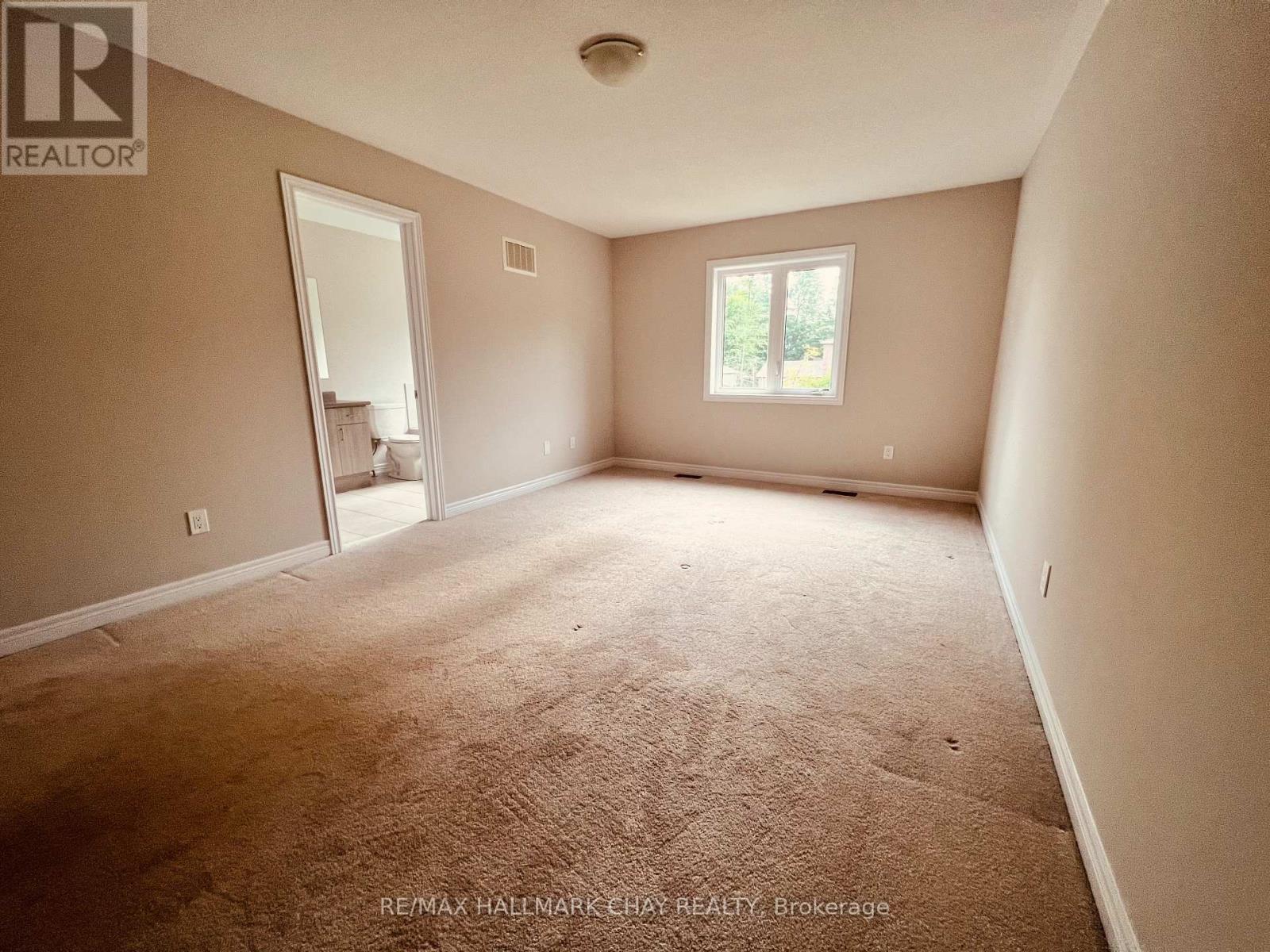 63 Greenwood Drive, Essa (Angus), Ontario  L0M 1B4 - Photo 10 - N12605480