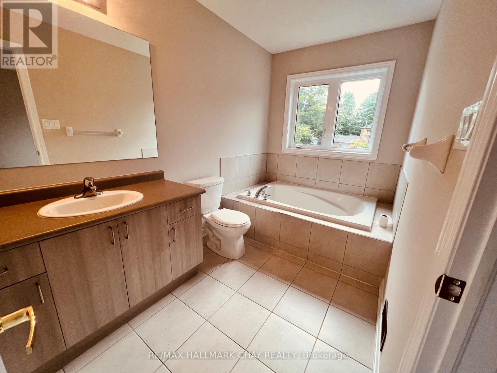 63 Greenwood Drive, Essa (Angus), Ontario  L0M 1B4 - Photo 11 - N12605480