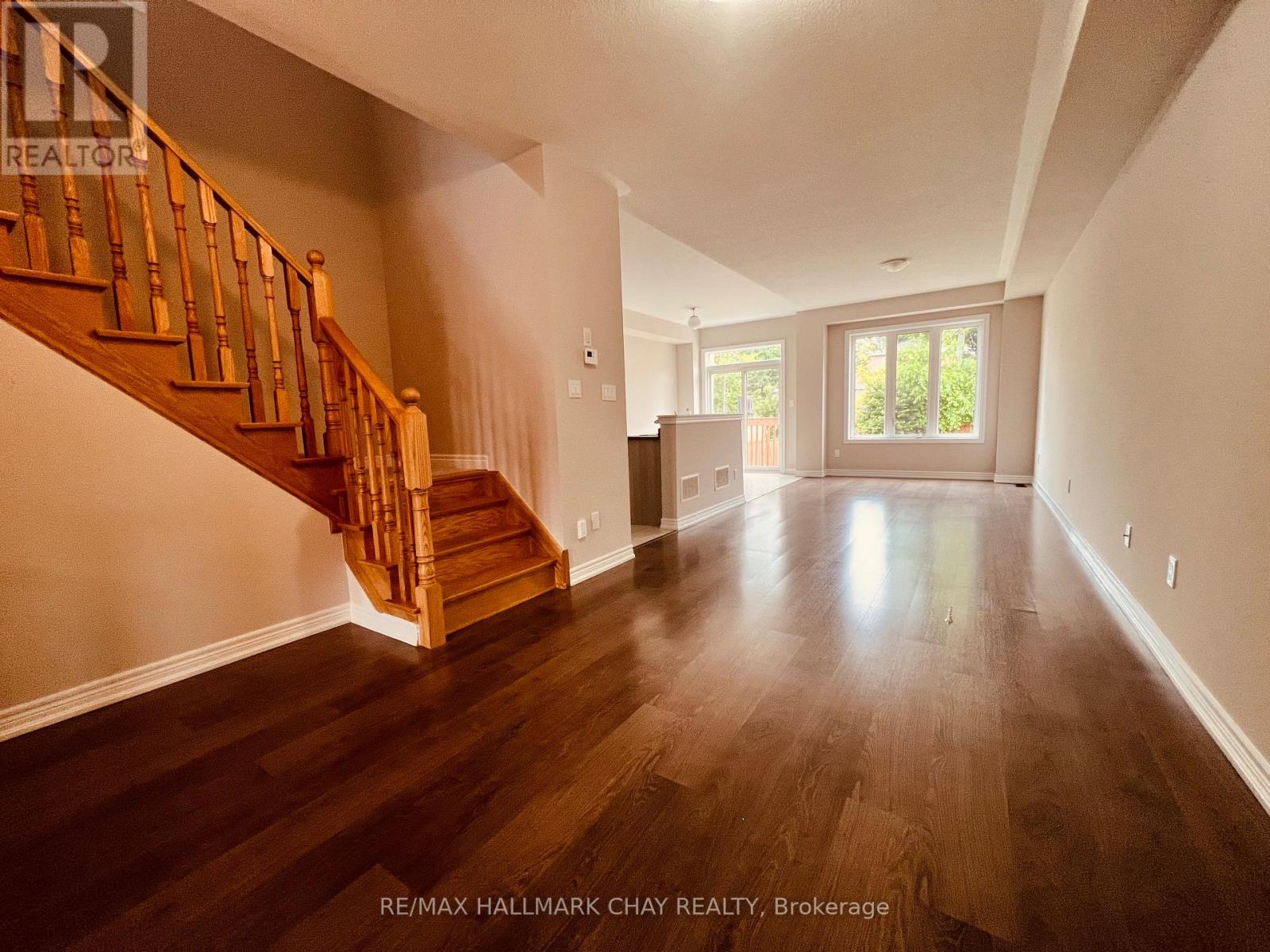 63 Greenwood Drive, Essa (Angus), Ontario  L0M 1B4 - Photo 3 - N12605480