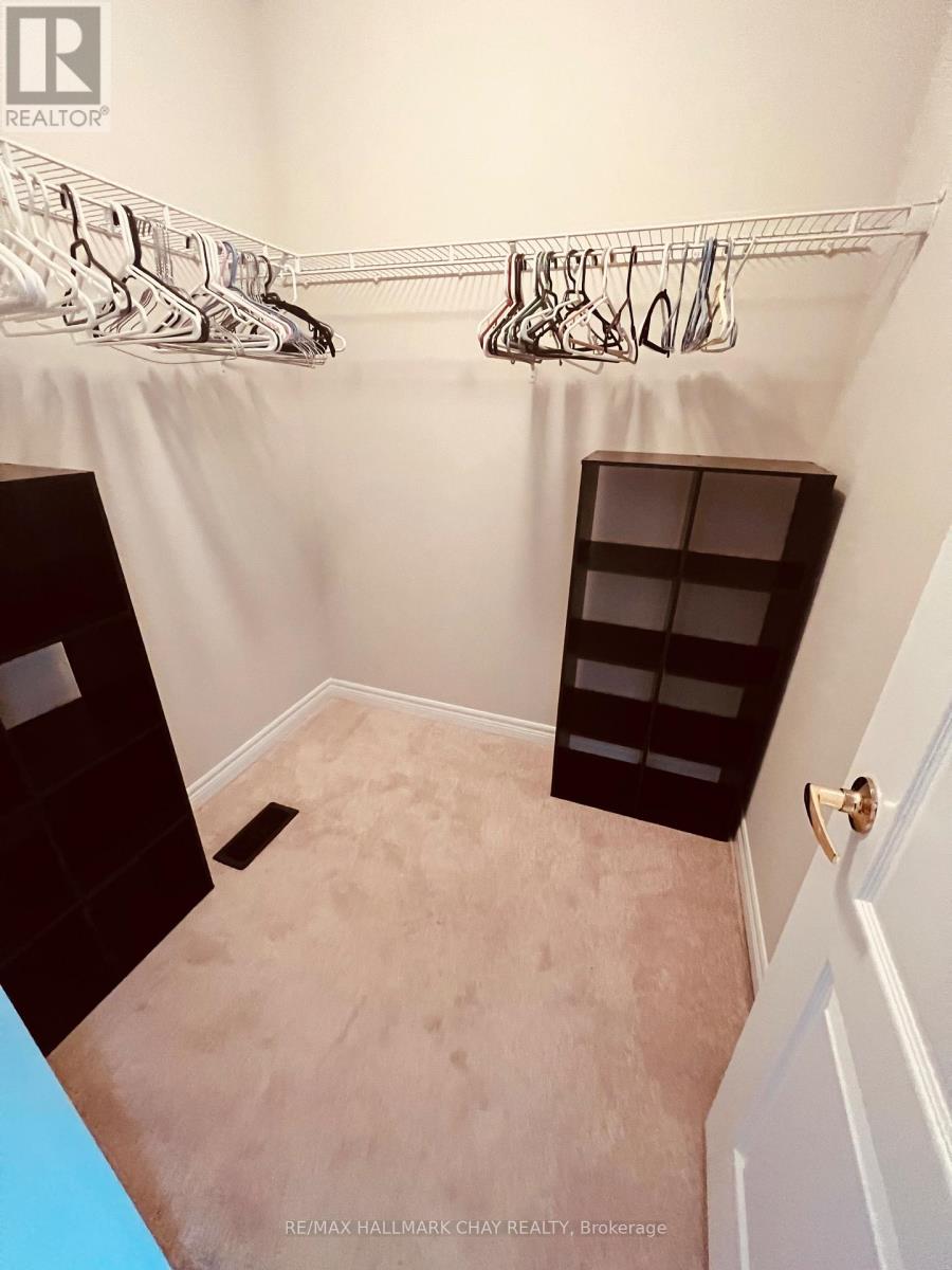 63 Greenwood Drive, Essa (Angus), Ontario  L0M 1B4 - Photo 8 - N12605480