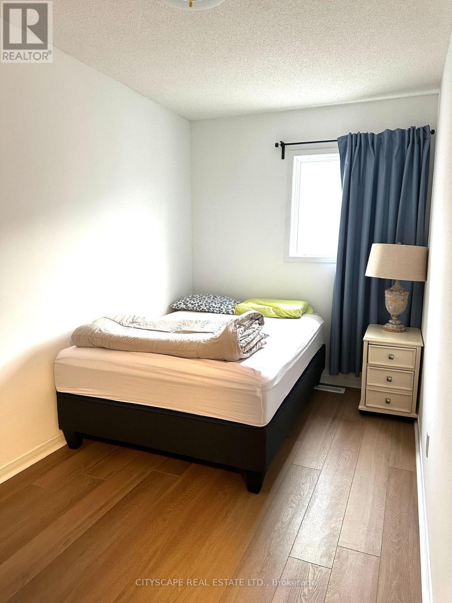 23 Rankin Crescent, Toronto, Ontario  M6P 4H1 - Photo 7 - W12605844