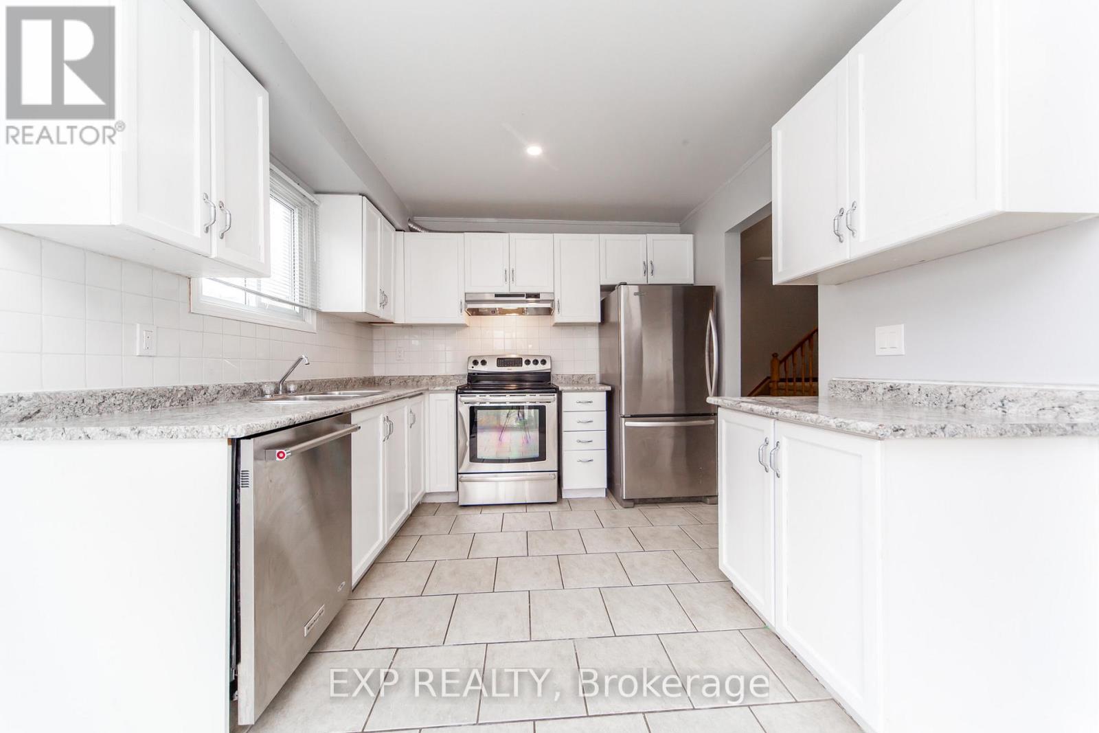 1447 Fleming Court, Oshawa, Ontario L1J 8B1 - Photo 4 - E12605966