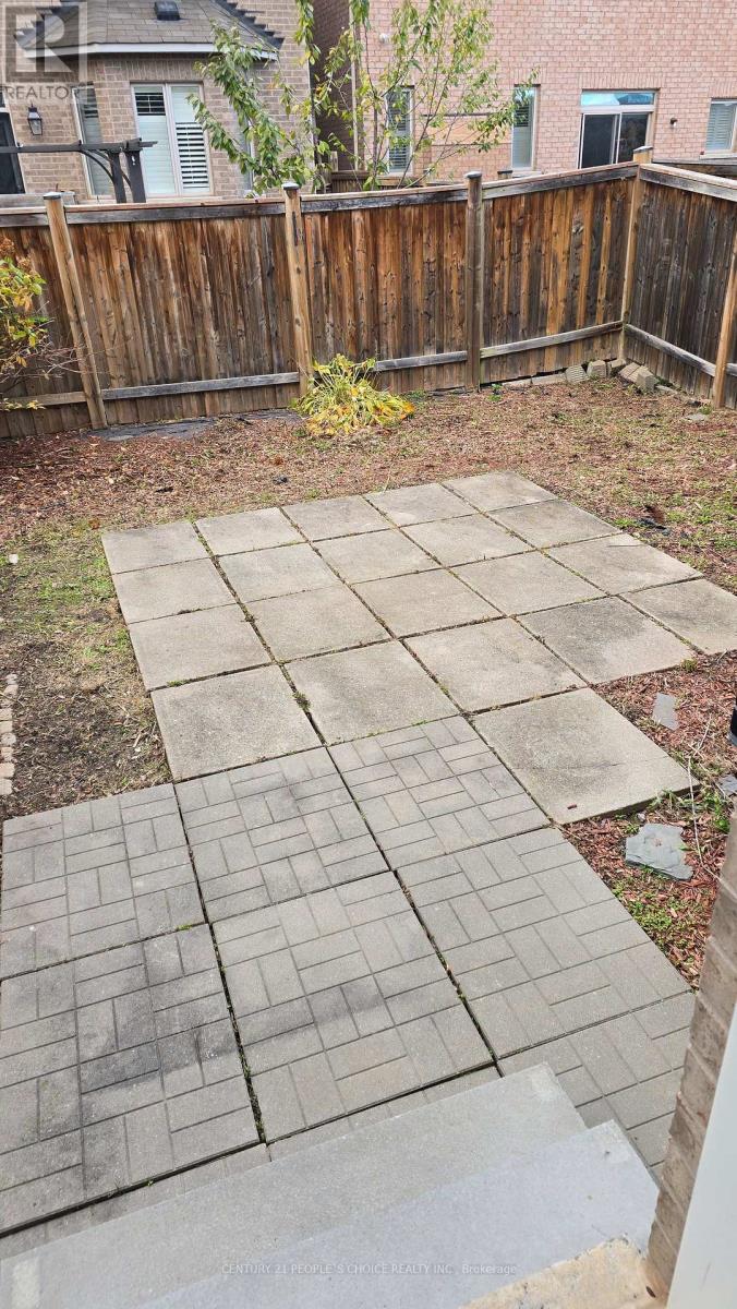 106 Bonnie Braes Drive, Brampton, Ontario  L6Y 5Y7 - Photo 7 - W12605990