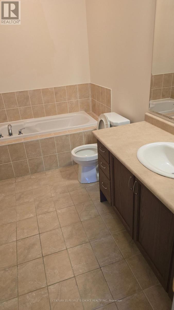 106 Bonnie Braes Drive, Brampton, Ontario  L6Y 5Y7 - Photo 8 - W12605990