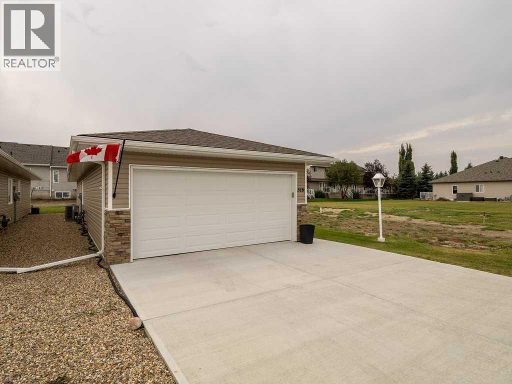318 Whispering Way, Vulcan, Alberta  T0L 2B0 - Photo 2 - A2273824