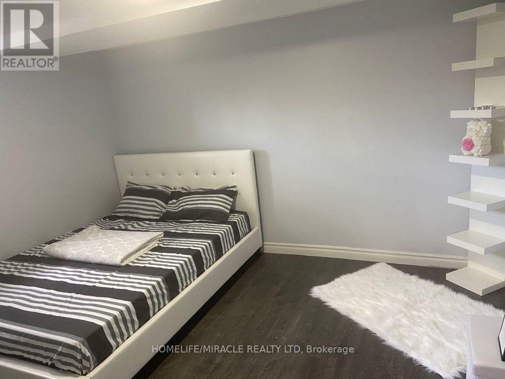 18 Rubydale Gardens, Toronto, Ontario  M9L 1B9 - Photo 44 - W12606232