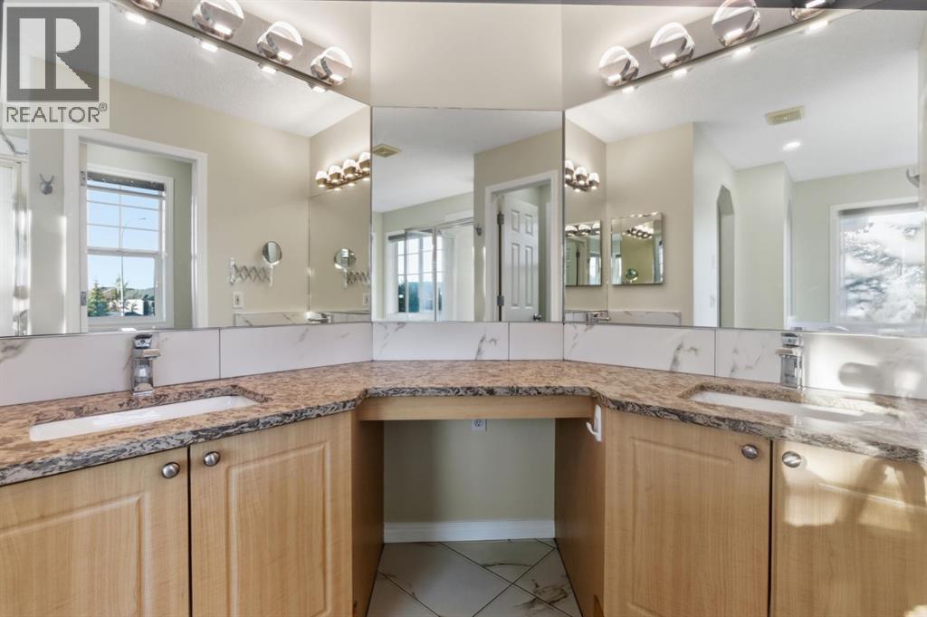 64 Cougarstone Square Sw, Calgary, Alberta  T3H 5J4 - Photo 26 - A2272775