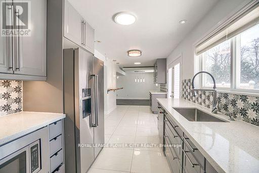 Main Floor - 12 Gondola Crescent, Brampton, Ontario  L6S 1W6 - Photo 16 - W12606404